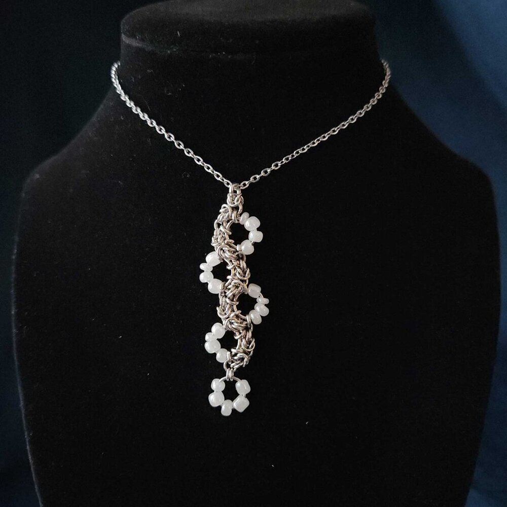Unique white pearl and silver snake necklace with a small silver chain - Picture 10 of 11